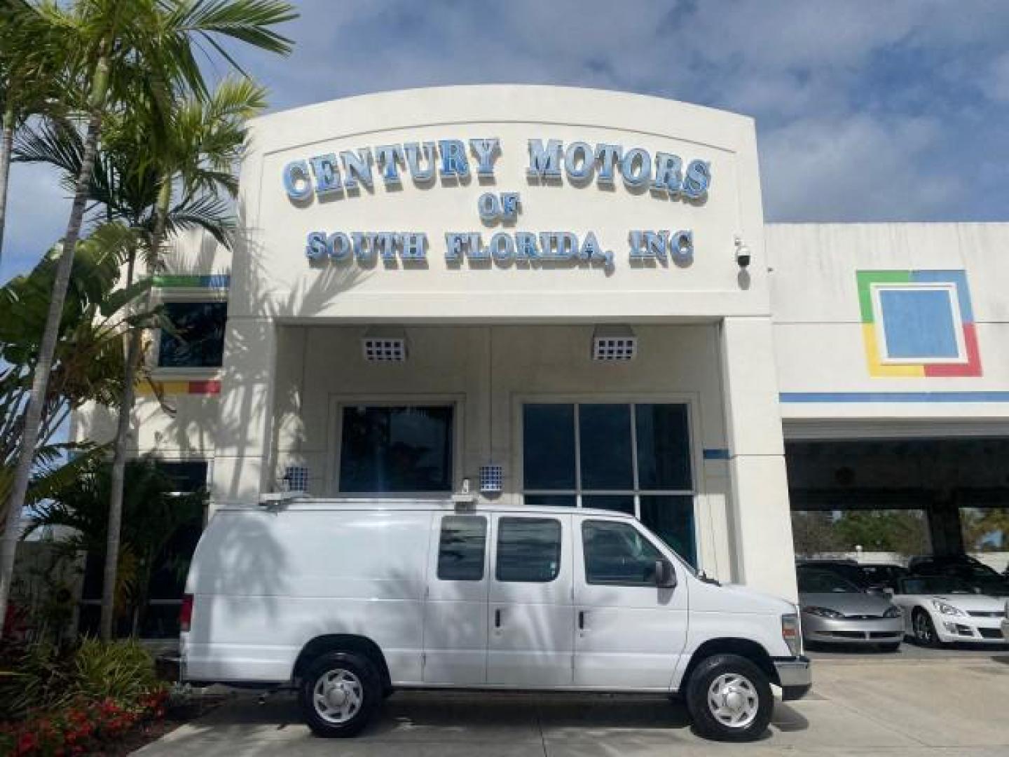 2014 Oxford White /Medium Flint Ford Econoline Cargo Van EXTENDED LOW MILES 6,380 1 OWNER (1FTNS1EW3ED) with an 4.6L EFI V8 FFV Capable Engine engine, Automatic transmission, located at 4701 North Dixie Hwy, Pompano Beach, FL, 33064, (954) 422-2889, 26.240938, -80.123474 - OUR WEBPAGE FLORIDACARS1.COM HAS OVER 100 PHOTOS AND FREE CARFAX LINK 2014 Ford E-Series E-150 1 OWNER Van 4.6L V8 F SOHC 16V Gasoline 16 MPG Rear Wheel Drive Features ABS Brakes Air Conditioning AM/FM Stereo Automatic Transmission Auxiliary Audio Input Barn Doors Power Locks Traction Control Vinyl - Photo#0
