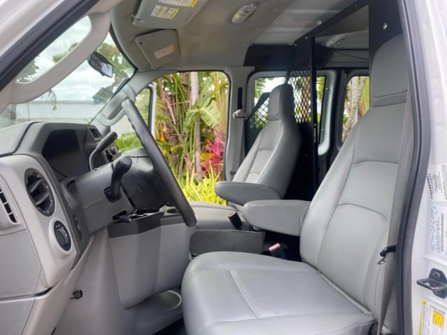 2014 Oxford White /Medium Flint Ford Econoline Cargo Van EXTENDED LOW MILES 6,380 1 OWNER (1FTNS1EW3ED) with an 4.6L EFI V8 FFV Capable Engine engine, Automatic transmission, located at 4701 North Dixie Hwy, Pompano Beach, FL, 33064, (954) 422-2889, 26.240938, -80.123474 - OUR WEBPAGE FLORIDACARS1.COM HAS OVER 100 PHOTOS AND FREE CARFAX LINK 2014 Ford E-Series E-150 1 OWNER Van 4.6L V8 F SOHC 16V Gasoline 16 MPG Rear Wheel Drive Features ABS Brakes Air Conditioning AM/FM Stereo Automatic Transmission Auxiliary Audio Input Barn Doors Power Locks Traction Control Vinyl - Photo#10