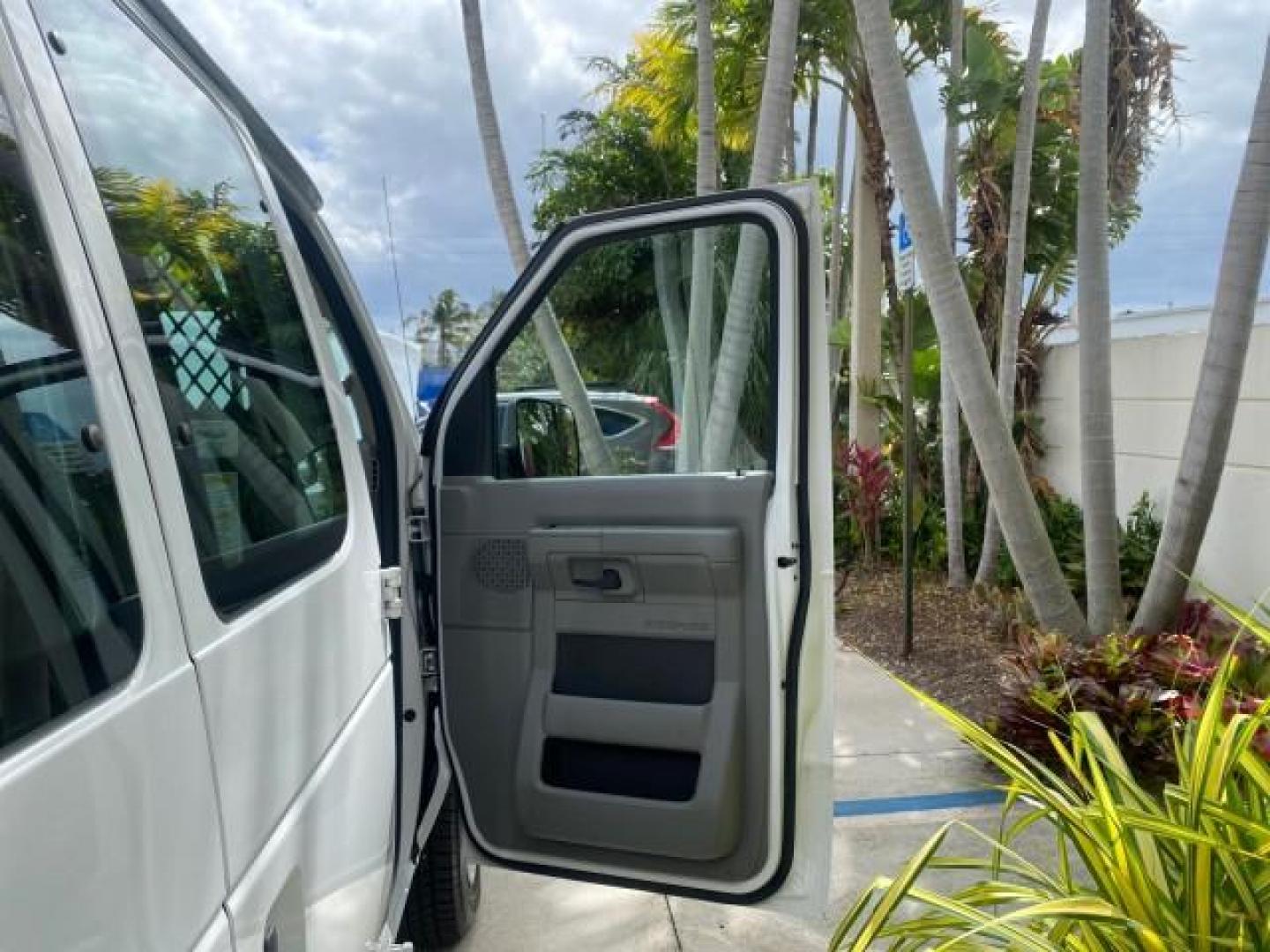 2014 Oxford White /Medium Flint Ford Econoline Cargo Van EXTENDED LOW MILES 6,380 1 OWNER (1FTNS1EW3ED) with an 4.6L EFI V8 FFV Capable Engine engine, Automatic transmission, located at 4701 North Dixie Hwy, Pompano Beach, FL, 33064, (954) 422-2889, 26.240938, -80.123474 - OUR WEBPAGE FLORIDACARS1.COM HAS OVER 100 PHOTOS AND FREE CARFAX LINK 2014 Ford E-Series E-150 1 OWNER Van 4.6L V8 F SOHC 16V Gasoline 16 MPG Rear Wheel Drive Features ABS Brakes Air Conditioning AM/FM Stereo Automatic Transmission Auxiliary Audio Input Barn Doors Power Locks Traction Control Vinyl - Photo#11