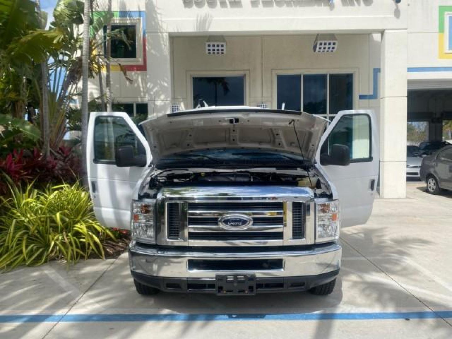 2014 Oxford White /Medium Flint Ford Econoline Cargo Van EXTENDED LOW MILES 6,380 1 OWNER (1FTNS1EW3ED) with an 4.6L EFI V8 FFV Capable Engine engine, Automatic transmission, located at 4701 North Dixie Hwy, Pompano Beach, FL, 33064, (954) 422-2889, 26.240938, -80.123474 - OUR WEBPAGE FLORIDACARS1.COM HAS OVER 100 PHOTOS AND FREE CARFAX LINK 2014 Ford E-Series E-150 1 OWNER Van 4.6L V8 F SOHC 16V Gasoline 16 MPG Rear Wheel Drive Features ABS Brakes Air Conditioning AM/FM Stereo Automatic Transmission Auxiliary Audio Input Barn Doors Power Locks Traction Control Vinyl - Photo#16