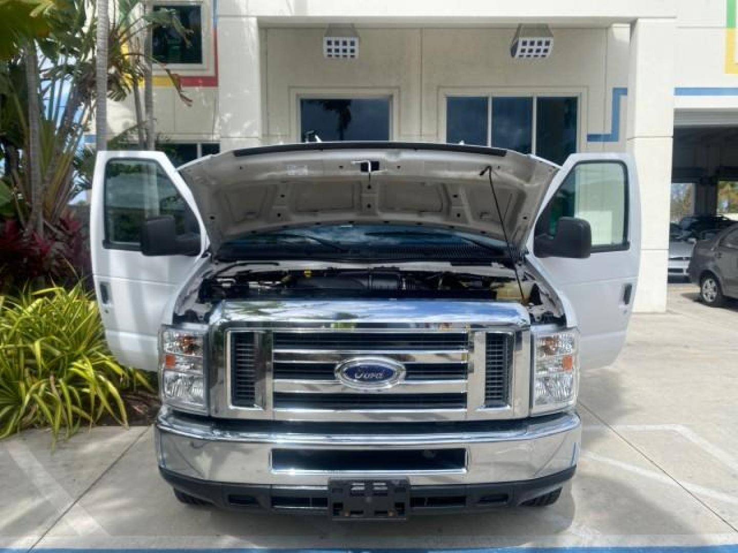 2014 Oxford White /Medium Flint Ford Econoline Cargo Van EXTENDED LOW MILES 6,380 1 OWNER (1FTNS1EW3ED) with an 4.6L EFI V8 FFV Capable Engine engine, Automatic transmission, located at 4701 North Dixie Hwy, Pompano Beach, FL, 33064, (954) 422-2889, 26.240938, -80.123474 - OUR WEBPAGE FLORIDACARS1.COM HAS OVER 100 PHOTOS AND FREE CARFAX LINK 2014 Ford E-Series E-150 1 OWNER Van 4.6L V8 F SOHC 16V Gasoline 16 MPG Rear Wheel Drive Features ABS Brakes Air Conditioning AM/FM Stereo Automatic Transmission Auxiliary Audio Input Barn Doors Power Locks Traction Control Vinyl - Photo#17