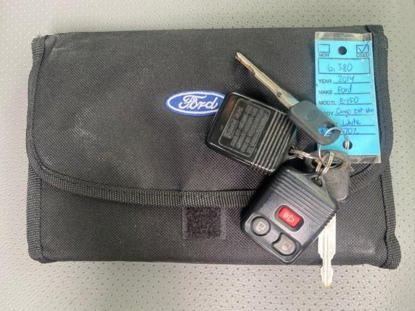 2014 Oxford White /Medium Flint Ford Econoline Cargo Van EXTENDED LOW MILES 6,380 1 OWNER (1FTNS1EW3ED) with an 4.6L EFI V8 FFV Capable Engine engine, Automatic transmission, located at 4701 North Dixie Hwy, Pompano Beach, FL, 33064, (954) 422-2889, 26.240938, -80.123474 - OUR WEBPAGE FLORIDACARS1.COM HAS OVER 100 PHOTOS AND FREE CARFAX LINK 2014 Ford E-Series E-150 1 OWNER Van 4.6L V8 F SOHC 16V Gasoline 16 MPG Rear Wheel Drive Features ABS Brakes Air Conditioning AM/FM Stereo Automatic Transmission Auxiliary Audio Input Barn Doors Power Locks Traction Control Vinyl - Photo#23