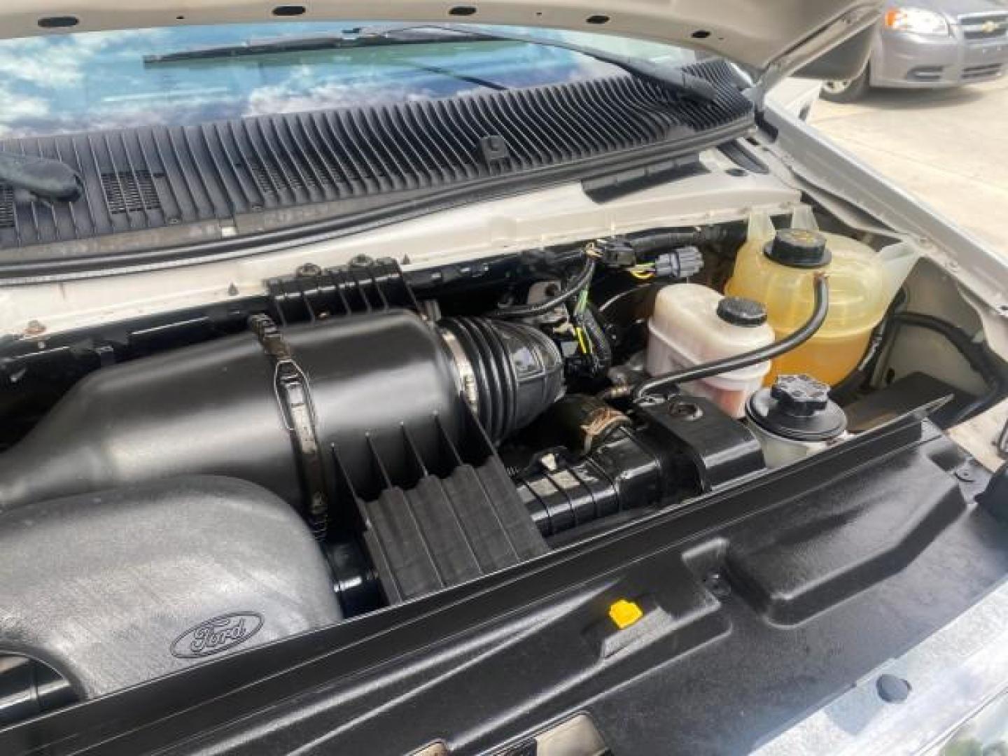 2014 Oxford White /Medium Flint Ford Econoline Cargo Van EXTENDED LOW MILES 6,380 1 OWNER (1FTNS1EW3ED) with an 4.6L EFI V8 FFV Capable Engine engine, Automatic transmission, located at 4701 North Dixie Hwy, Pompano Beach, FL, 33064, (954) 422-2889, 26.240938, -80.123474 - OUR WEBPAGE FLORIDACARS1.COM HAS OVER 100 PHOTOS AND FREE CARFAX LINK 2014 Ford E-Series E-150 1 OWNER Van 4.6L V8 F SOHC 16V Gasoline 16 MPG Rear Wheel Drive Features ABS Brakes Air Conditioning AM/FM Stereo Automatic Transmission Auxiliary Audio Input Barn Doors Power Locks Traction Control Vinyl - Photo#25