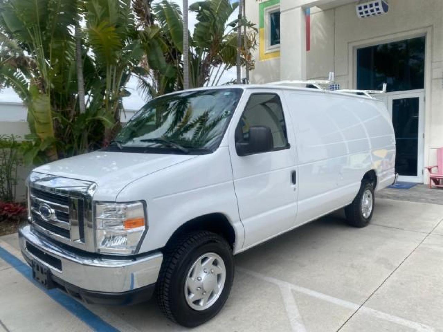 2014 Oxford White /Medium Flint Ford Econoline Cargo Van EXTENDED LOW MILES 6,380 1 OWNER (1FTNS1EW3ED) with an 4.6L EFI V8 FFV Capable Engine engine, Automatic transmission, located at 4701 North Dixie Hwy, Pompano Beach, FL, 33064, (954) 422-2889, 26.240938, -80.123474 - OUR WEBPAGE FLORIDACARS1.COM HAS OVER 100 PHOTOS AND FREE CARFAX LINK 2014 Ford E-Series E-150 1 OWNER Van 4.6L V8 F SOHC 16V Gasoline 16 MPG Rear Wheel Drive Features ABS Brakes Air Conditioning AM/FM Stereo Automatic Transmission Auxiliary Audio Input Barn Doors Power Locks Traction Control Vinyl - Photo#29