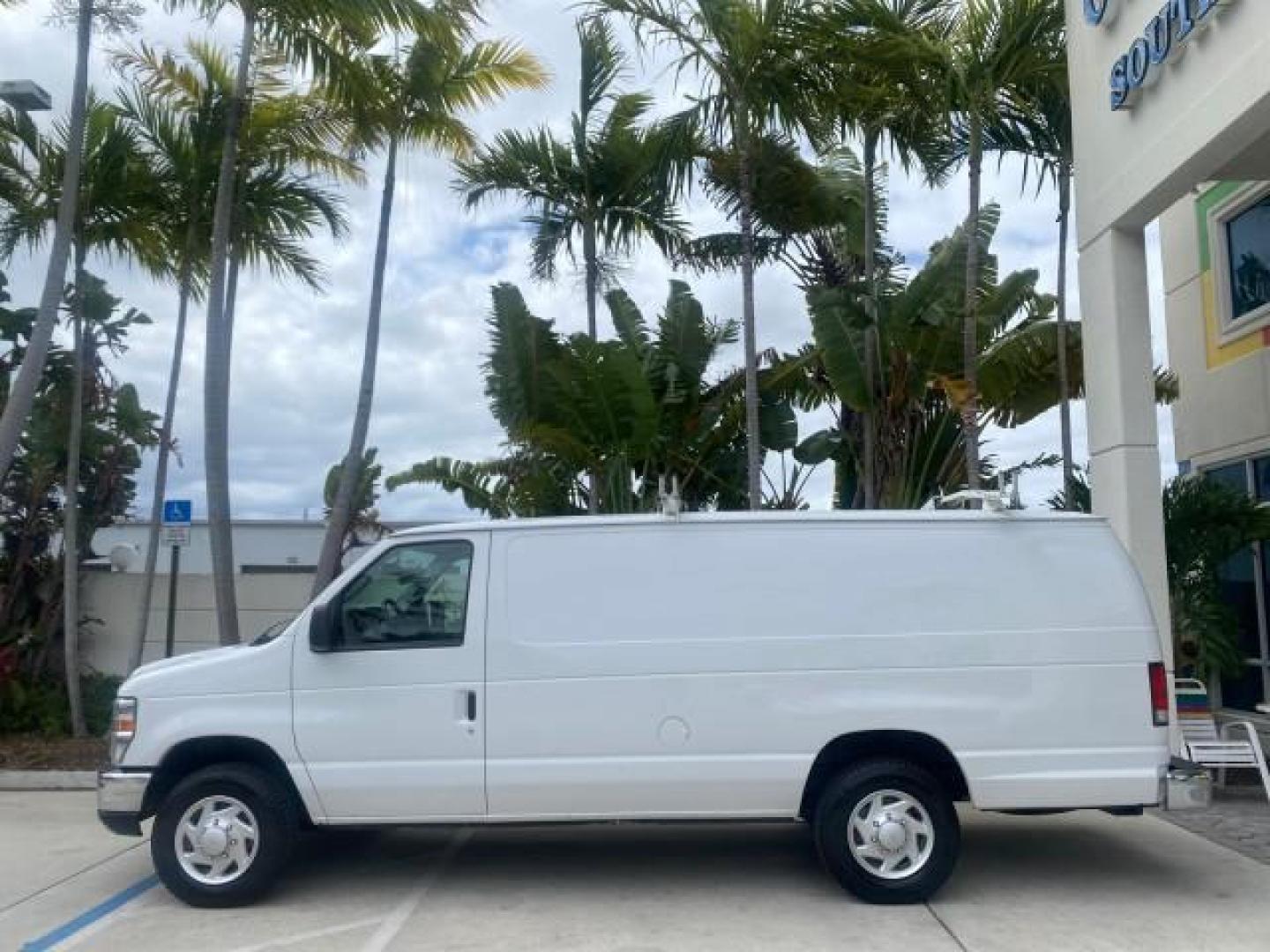 2014 Oxford White /Medium Flint Ford Econoline Cargo Van EXTENDED LOW MILES 6,380 1 OWNER (1FTNS1EW3ED) with an 4.6L EFI V8 FFV Capable Engine engine, Automatic transmission, located at 4701 North Dixie Hwy, Pompano Beach, FL, 33064, (954) 422-2889, 26.240938, -80.123474 - OUR WEBPAGE FLORIDACARS1.COM HAS OVER 100 PHOTOS AND FREE CARFAX LINK 2014 Ford E-Series E-150 1 OWNER Van 4.6L V8 F SOHC 16V Gasoline 16 MPG Rear Wheel Drive Features ABS Brakes Air Conditioning AM/FM Stereo Automatic Transmission Auxiliary Audio Input Barn Doors Power Locks Traction Control Vinyl - Photo#30