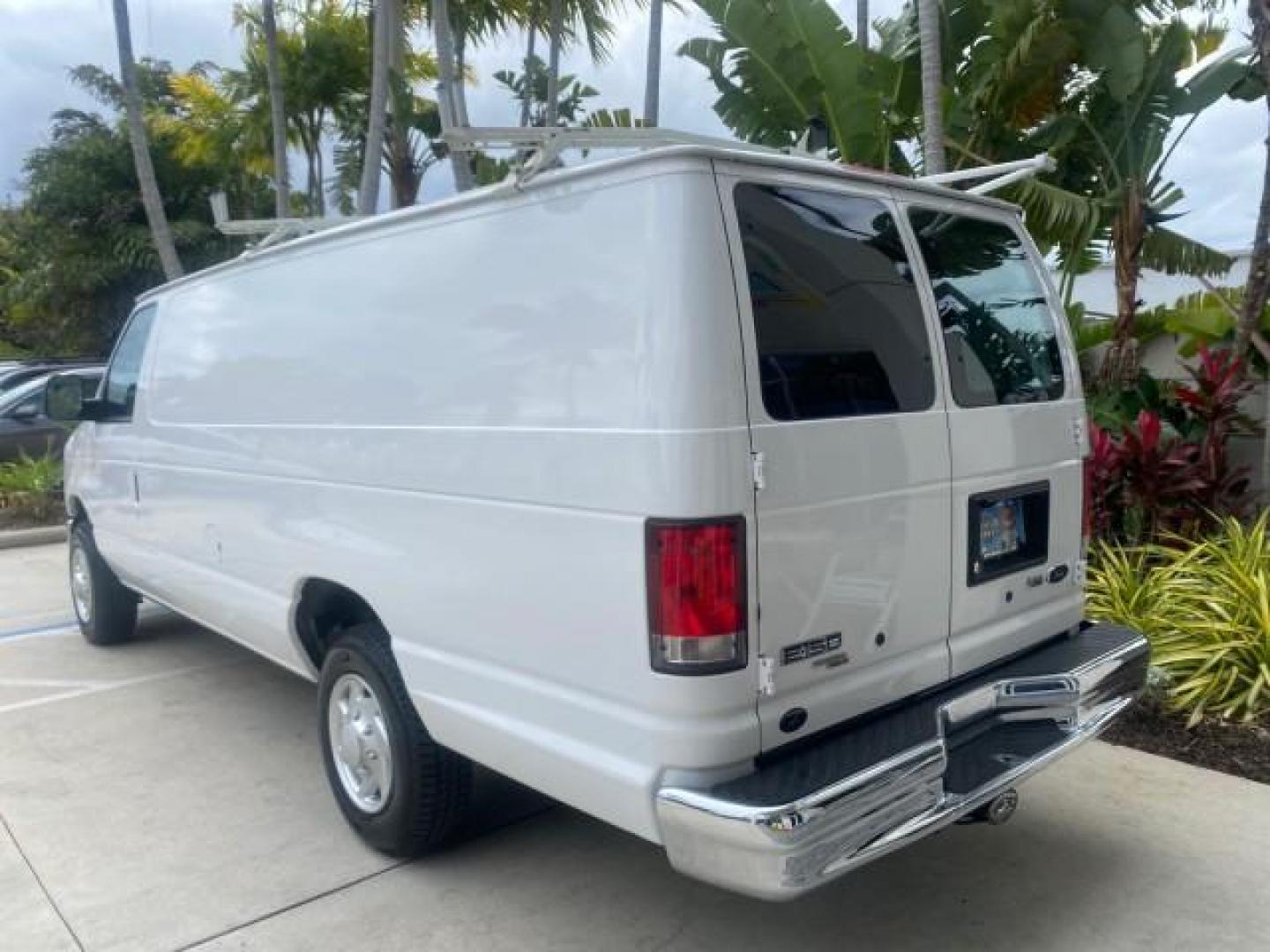 2014 Oxford White /Medium Flint Ford Econoline Cargo Van EXTENDED LOW MILES 6,380 1 OWNER (1FTNS1EW3ED) with an 4.6L EFI V8 FFV Capable Engine engine, Automatic transmission, located at 4701 North Dixie Hwy, Pompano Beach, FL, 33064, (954) 422-2889, 26.240938, -80.123474 - OUR WEBPAGE FLORIDACARS1.COM HAS OVER 100 PHOTOS AND FREE CARFAX LINK 2014 Ford E-Series E-150 1 OWNER Van 4.6L V8 F SOHC 16V Gasoline 16 MPG Rear Wheel Drive Features ABS Brakes Air Conditioning AM/FM Stereo Automatic Transmission Auxiliary Audio Input Barn Doors Power Locks Traction Control Vinyl - Photo#33