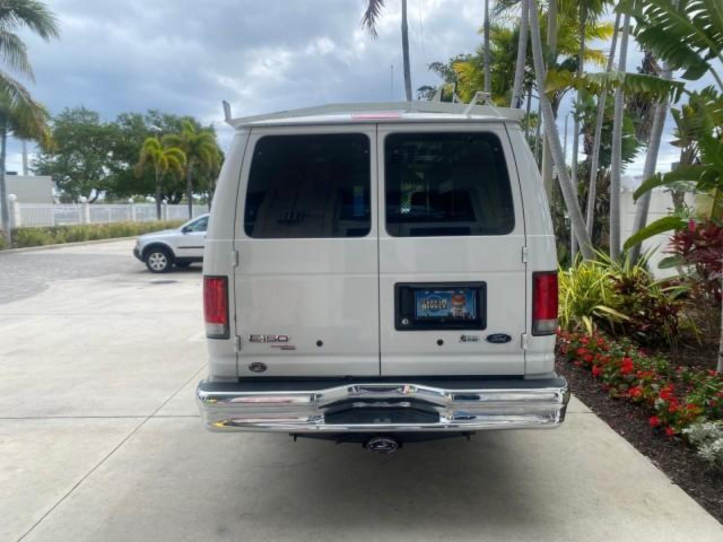 2014 Oxford White /Medium Flint Ford Econoline Cargo Van EXTENDED LOW MILES 6,380 1 OWNER (1FTNS1EW3ED) with an 4.6L EFI V8 FFV Capable Engine engine, Automatic transmission, located at 4701 North Dixie Hwy, Pompano Beach, FL, 33064, (954) 422-2889, 26.240938, -80.123474 - OUR WEBPAGE FLORIDACARS1.COM HAS OVER 100 PHOTOS AND FREE CARFAX LINK 2014 Ford E-Series E-150 1 OWNER Van 4.6L V8 F SOHC 16V Gasoline 16 MPG Rear Wheel Drive Features ABS Brakes Air Conditioning AM/FM Stereo Automatic Transmission Auxiliary Audio Input Barn Doors Power Locks Traction Control Vinyl - Photo#34