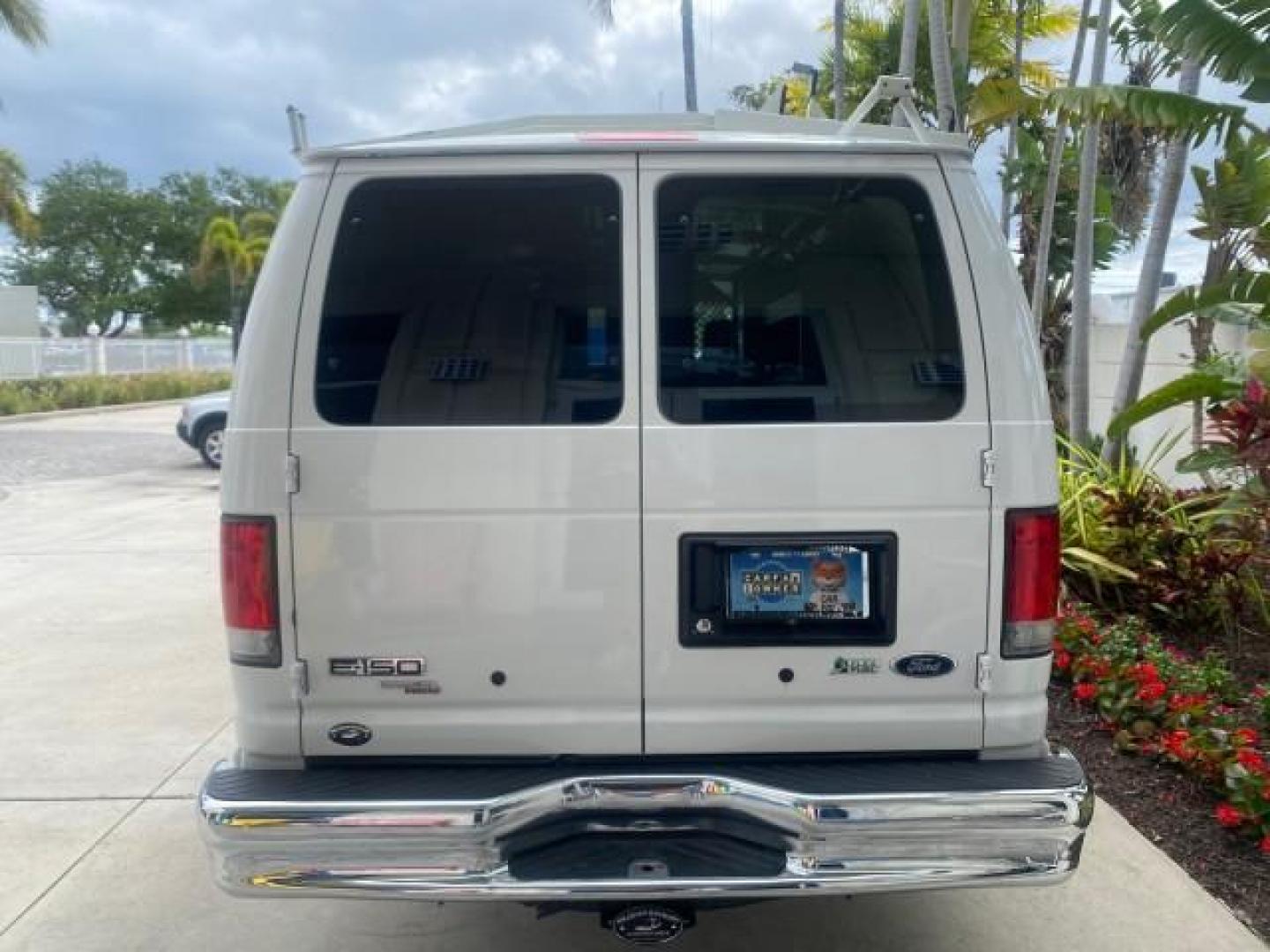 2014 Oxford White /Medium Flint Ford Econoline Cargo Van EXTENDED LOW MILES 6,380 1 OWNER (1FTNS1EW3ED) with an 4.6L EFI V8 FFV Capable Engine engine, Automatic transmission, located at 4701 North Dixie Hwy, Pompano Beach, FL, 33064, (954) 422-2889, 26.240938, -80.123474 - OUR WEBPAGE FLORIDACARS1.COM HAS OVER 100 PHOTOS AND FREE CARFAX LINK 2014 Ford E-Series E-150 1 OWNER Van 4.6L V8 F SOHC 16V Gasoline 16 MPG Rear Wheel Drive Features ABS Brakes Air Conditioning AM/FM Stereo Automatic Transmission Auxiliary Audio Input Barn Doors Power Locks Traction Control Vinyl - Photo#35