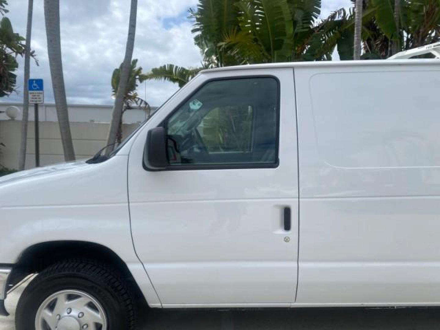 2014 Oxford White /Medium Flint Ford Econoline Cargo Van EXTENDED LOW MILES 6,380 1 OWNER (1FTNS1EW3ED) with an 4.6L EFI V8 FFV Capable Engine engine, Automatic transmission, located at 4701 North Dixie Hwy, Pompano Beach, FL, 33064, (954) 422-2889, 26.240938, -80.123474 - OUR WEBPAGE FLORIDACARS1.COM HAS OVER 100 PHOTOS AND FREE CARFAX LINK 2014 Ford E-Series E-150 1 OWNER Van 4.6L V8 F SOHC 16V Gasoline 16 MPG Rear Wheel Drive Features ABS Brakes Air Conditioning AM/FM Stereo Automatic Transmission Auxiliary Audio Input Barn Doors Power Locks Traction Control Vinyl - Photo#37