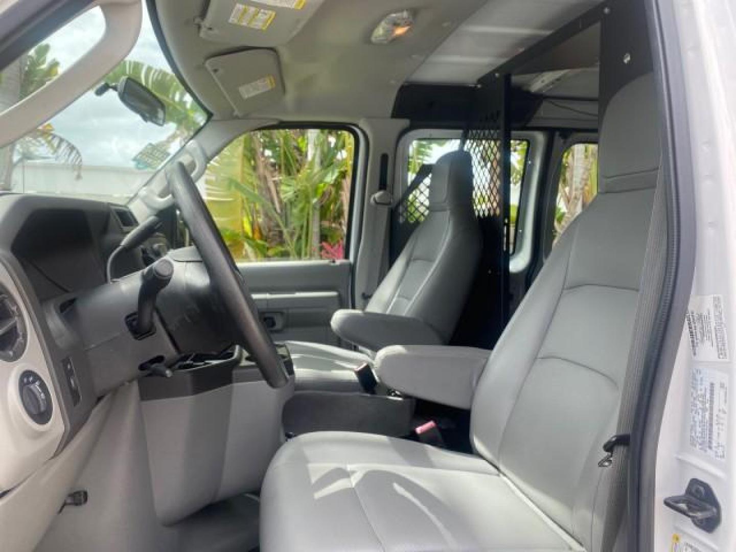 2014 Oxford White /Medium Flint Ford Econoline Cargo Van EXTENDED LOW MILES 6,380 1 OWNER (1FTNS1EW3ED) with an 4.6L EFI V8 FFV Capable Engine engine, Automatic transmission, located at 4701 North Dixie Hwy, Pompano Beach, FL, 33064, (954) 422-2889, 26.240938, -80.123474 - OUR WEBPAGE FLORIDACARS1.COM HAS OVER 100 PHOTOS AND FREE CARFAX LINK 2014 Ford E-Series E-150 1 OWNER Van 4.6L V8 F SOHC 16V Gasoline 16 MPG Rear Wheel Drive Features ABS Brakes Air Conditioning AM/FM Stereo Automatic Transmission Auxiliary Audio Input Barn Doors Power Locks Traction Control Vinyl - Photo#43