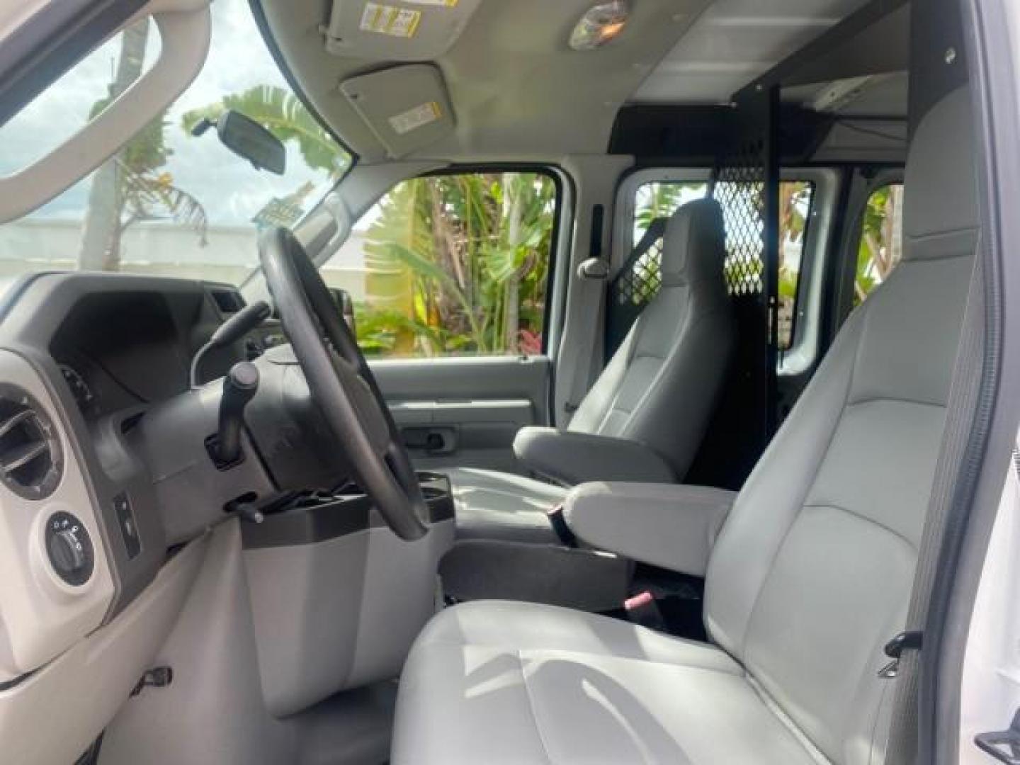 2014 Oxford White /Medium Flint Ford Econoline Cargo Van EXTENDED LOW MILES 6,380 1 OWNER (1FTNS1EW3ED) with an 4.6L EFI V8 FFV Capable Engine engine, Automatic transmission, located at 4701 North Dixie Hwy, Pompano Beach, FL, 33064, (954) 422-2889, 26.240938, -80.123474 - OUR WEBPAGE FLORIDACARS1.COM HAS OVER 100 PHOTOS AND FREE CARFAX LINK 2014 Ford E-Series E-150 1 OWNER Van 4.6L V8 F SOHC 16V Gasoline 16 MPG Rear Wheel Drive Features ABS Brakes Air Conditioning AM/FM Stereo Automatic Transmission Auxiliary Audio Input Barn Doors Power Locks Traction Control Vinyl - Photo#44