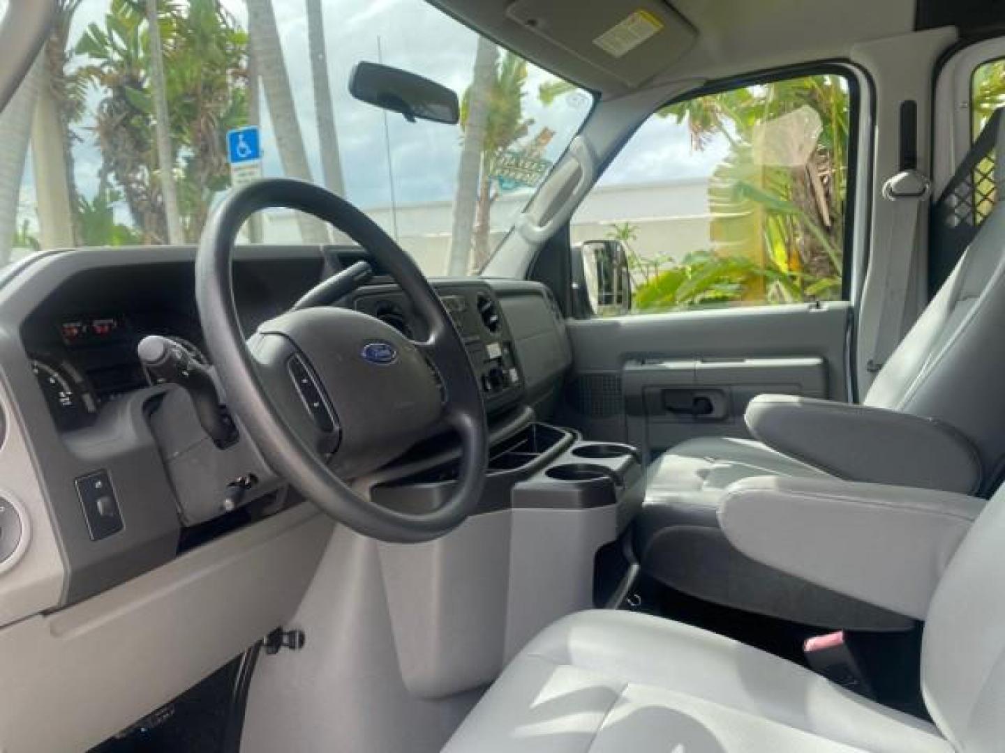 2014 Oxford White /Medium Flint Ford Econoline Cargo Van EXTENDED LOW MILES 6,380 1 OWNER (1FTNS1EW3ED) with an 4.6L EFI V8 FFV Capable Engine engine, Automatic transmission, located at 4701 North Dixie Hwy, Pompano Beach, FL, 33064, (954) 422-2889, 26.240938, -80.123474 - OUR WEBPAGE FLORIDACARS1.COM HAS OVER 100 PHOTOS AND FREE CARFAX LINK 2014 Ford E-Series E-150 1 OWNER Van 4.6L V8 F SOHC 16V Gasoline 16 MPG Rear Wheel Drive Features ABS Brakes Air Conditioning AM/FM Stereo Automatic Transmission Auxiliary Audio Input Barn Doors Power Locks Traction Control Vinyl - Photo#46