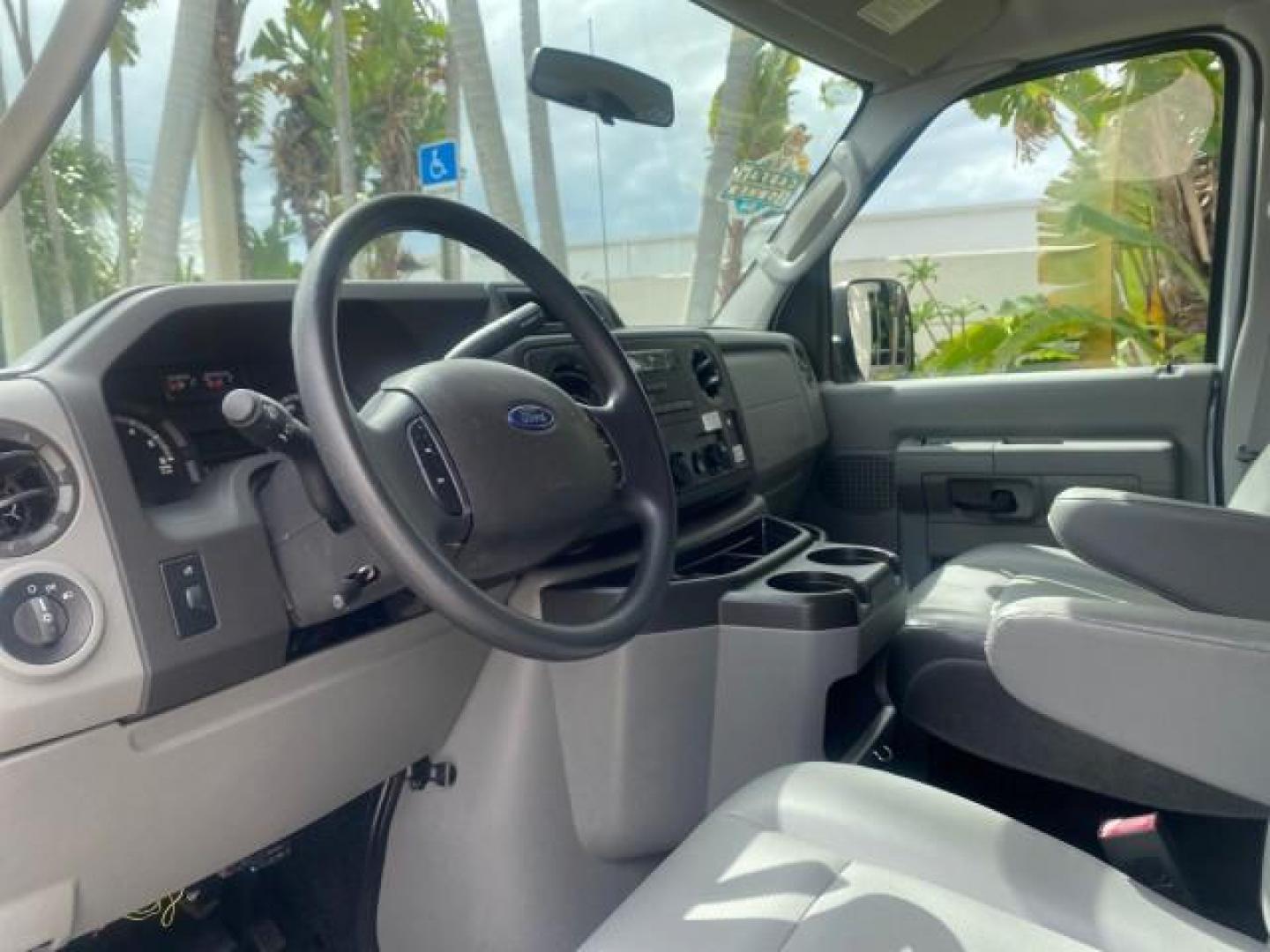 2014 Oxford White /Medium Flint Ford Econoline Cargo Van EXTENDED LOW MILES 6,380 1 OWNER (1FTNS1EW3ED) with an 4.6L EFI V8 FFV Capable Engine engine, Automatic transmission, located at 4701 North Dixie Hwy, Pompano Beach, FL, 33064, (954) 422-2889, 26.240938, -80.123474 - OUR WEBPAGE FLORIDACARS1.COM HAS OVER 100 PHOTOS AND FREE CARFAX LINK 2014 Ford E-Series E-150 1 OWNER Van 4.6L V8 F SOHC 16V Gasoline 16 MPG Rear Wheel Drive Features ABS Brakes Air Conditioning AM/FM Stereo Automatic Transmission Auxiliary Audio Input Barn Doors Power Locks Traction Control Vinyl - Photo#47