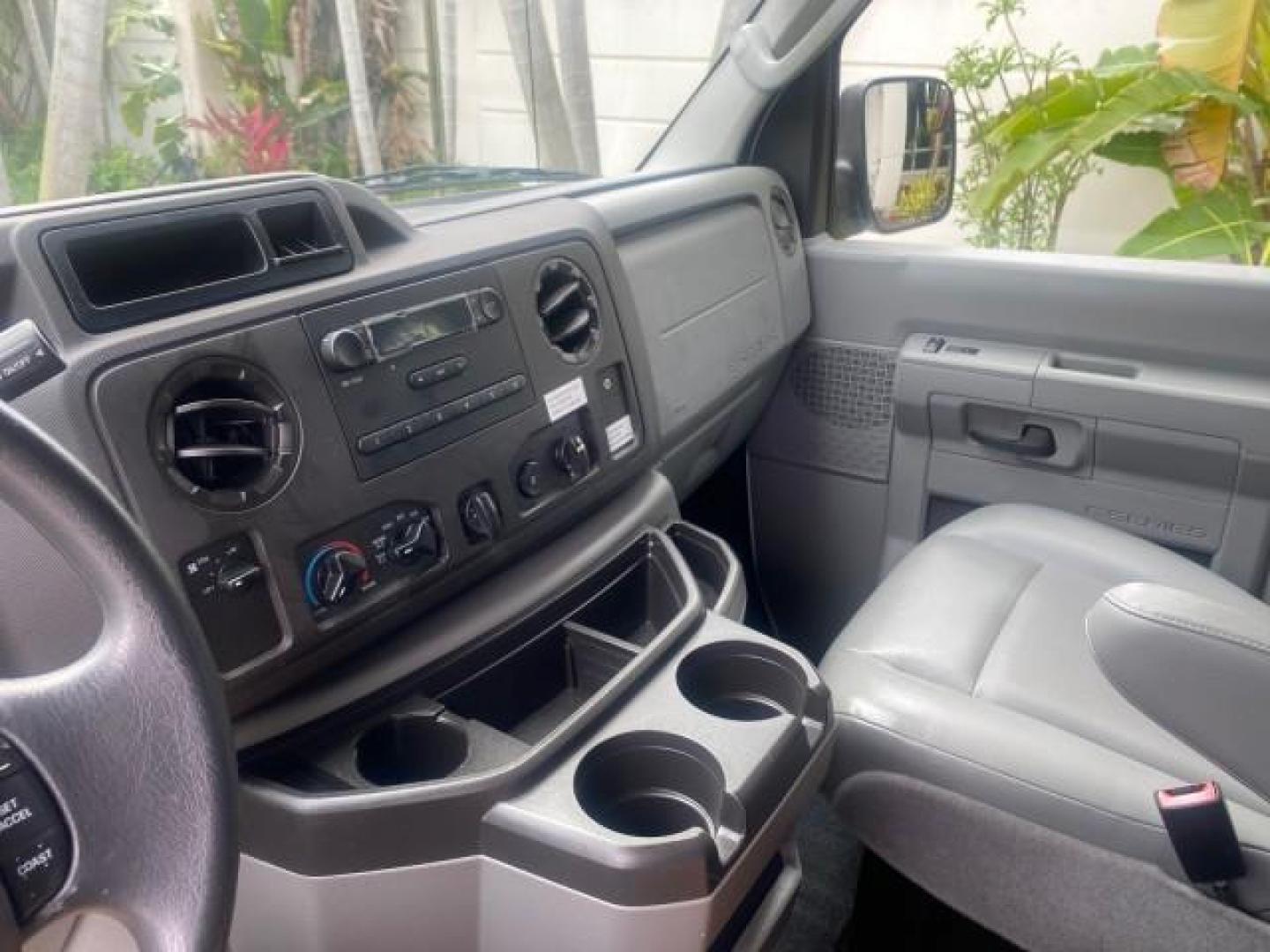 2014 Oxford White /Medium Flint Ford Econoline Cargo Van EXTENDED LOW MILES 6,380 1 OWNER (1FTNS1EW3ED) with an 4.6L EFI V8 FFV Capable Engine engine, Automatic transmission, located at 4701 North Dixie Hwy, Pompano Beach, FL, 33064, (954) 422-2889, 26.240938, -80.123474 - OUR WEBPAGE FLORIDACARS1.COM HAS OVER 100 PHOTOS AND FREE CARFAX LINK 2014 Ford E-Series E-150 1 OWNER Van 4.6L V8 F SOHC 16V Gasoline 16 MPG Rear Wheel Drive Features ABS Brakes Air Conditioning AM/FM Stereo Automatic Transmission Auxiliary Audio Input Barn Doors Power Locks Traction Control Vinyl - Photo#65