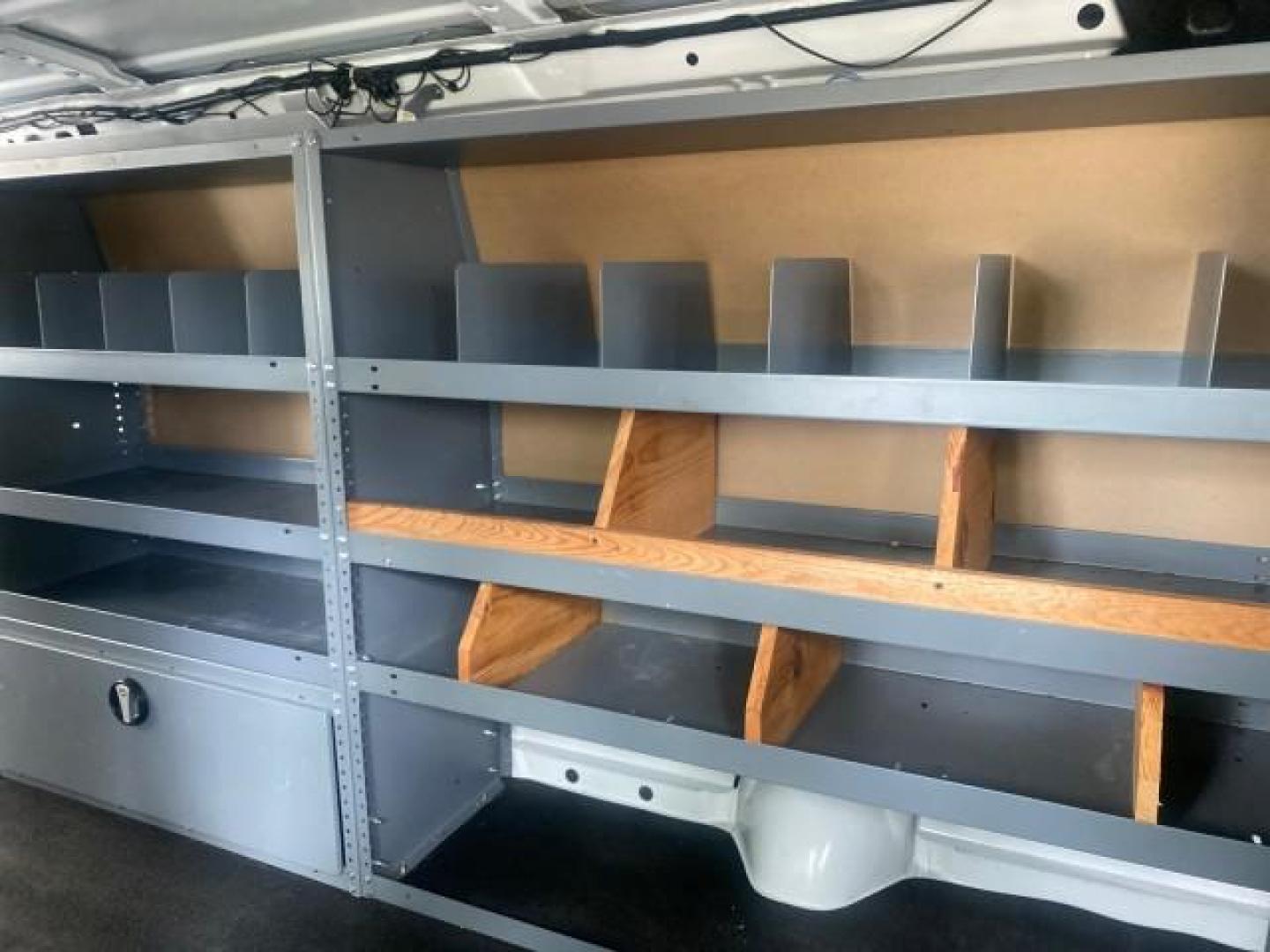 2014 Oxford White /Medium Flint Ford Econoline Cargo Van EXTENDED LOW MILES 6,380 1 OWNER (1FTNS1EW3ED) with an 4.6L EFI V8 FFV Capable Engine engine, Automatic transmission, located at 4701 North Dixie Hwy, Pompano Beach, FL, 33064, (954) 422-2889, 26.240938, -80.123474 - OUR WEBPAGE FLORIDACARS1.COM HAS OVER 100 PHOTOS AND FREE CARFAX LINK 2014 Ford E-Series E-150 1 OWNER Van 4.6L V8 F SOHC 16V Gasoline 16 MPG Rear Wheel Drive Features ABS Brakes Air Conditioning AM/FM Stereo Automatic Transmission Auxiliary Audio Input Barn Doors Power Locks Traction Control Vinyl - Photo#77