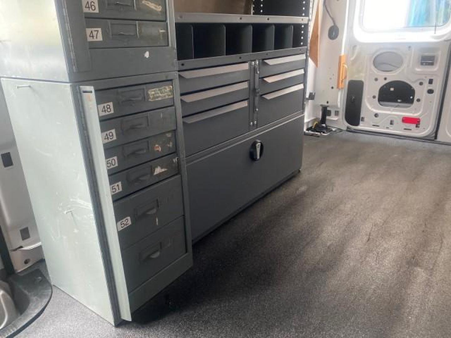 2014 Oxford White /Medium Flint Ford Econoline Cargo Van EXTENDED LOW MILES 6,380 1 OWNER (1FTNS1EW3ED) with an 4.6L EFI V8 FFV Capable Engine engine, Automatic transmission, located at 4701 North Dixie Hwy, Pompano Beach, FL, 33064, (954) 422-2889, 26.240938, -80.123474 - OUR WEBPAGE FLORIDACARS1.COM HAS OVER 100 PHOTOS AND FREE CARFAX LINK 2014 Ford E-Series E-150 1 OWNER Van 4.6L V8 F SOHC 16V Gasoline 16 MPG Rear Wheel Drive Features ABS Brakes Air Conditioning AM/FM Stereo Automatic Transmission Auxiliary Audio Input Barn Doors Power Locks Traction Control Vinyl - Photo#81