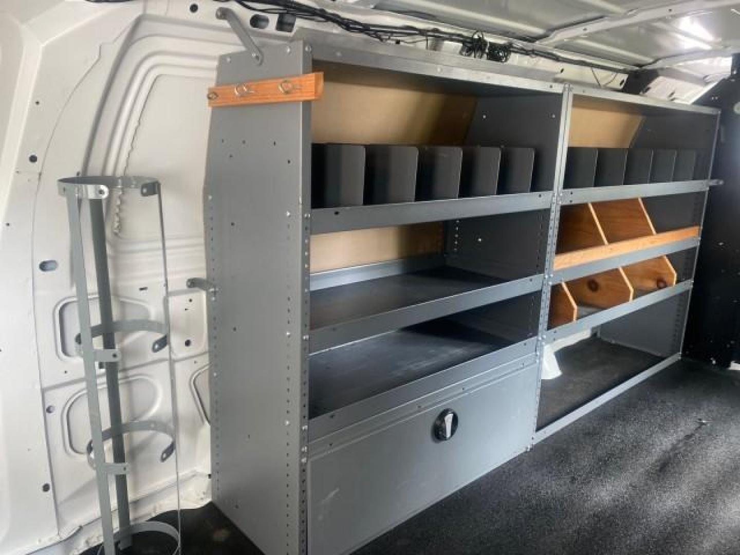 2014 Oxford White /Medium Flint Ford Econoline Cargo Van EXTENDED LOW MILES 6,380 1 OWNER (1FTNS1EW3ED) with an 4.6L EFI V8 FFV Capable Engine engine, Automatic transmission, located at 4701 North Dixie Hwy, Pompano Beach, FL, 33064, (954) 422-2889, 26.240938, -80.123474 - OUR WEBPAGE FLORIDACARS1.COM HAS OVER 100 PHOTOS AND FREE CARFAX LINK 2014 Ford E-Series E-150 1 OWNER Van 4.6L V8 F SOHC 16V Gasoline 16 MPG Rear Wheel Drive Features ABS Brakes Air Conditioning AM/FM Stereo Automatic Transmission Auxiliary Audio Input Barn Doors Power Locks Traction Control Vinyl - Photo#84