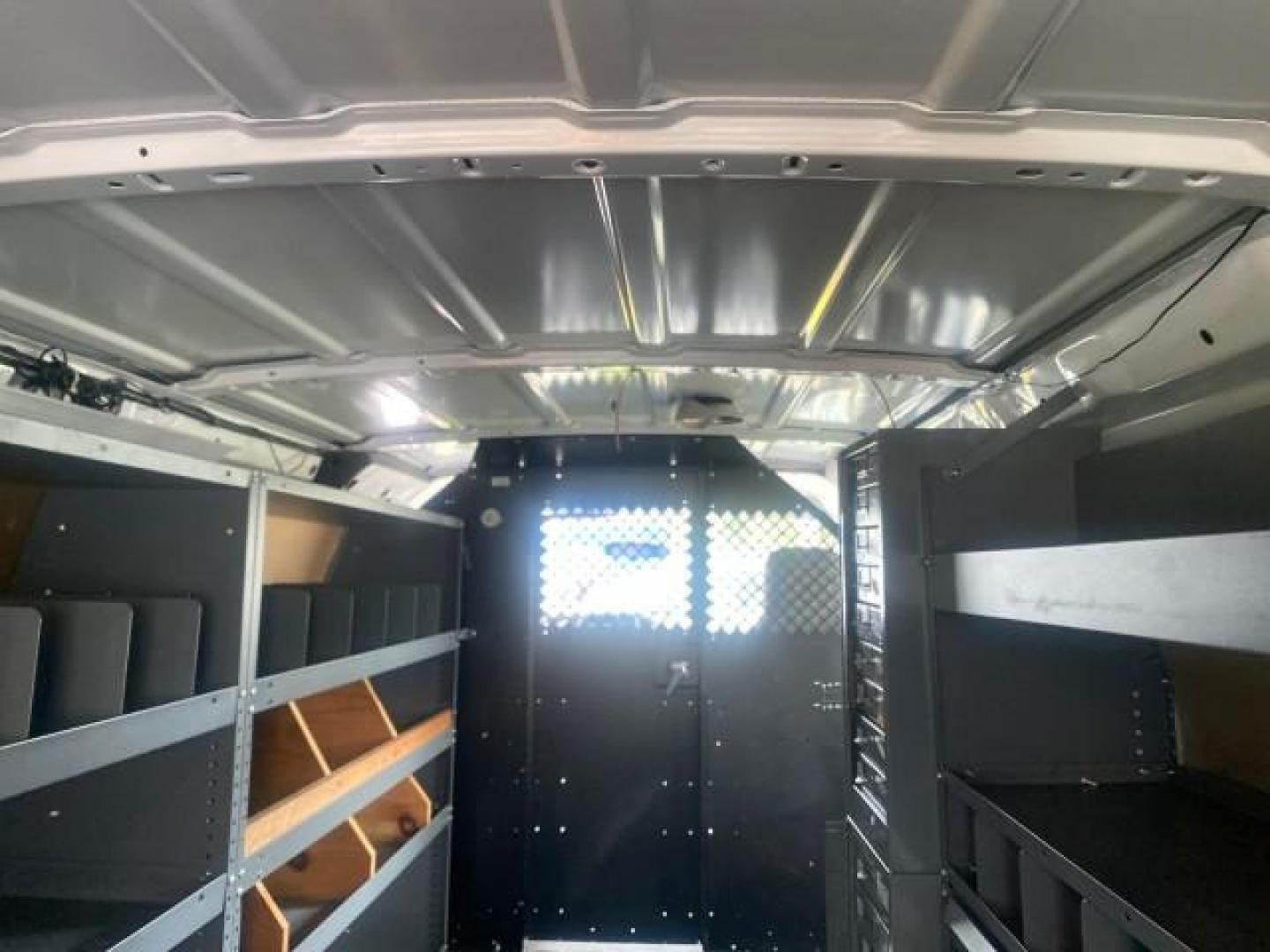 2014 Oxford White /Medium Flint Ford Econoline Cargo Van EXTENDED LOW MILES 6,380 1 OWNER (1FTNS1EW3ED) with an 4.6L EFI V8 FFV Capable Engine engine, Automatic transmission, located at 4701 North Dixie Hwy, Pompano Beach, FL, 33064, (954) 422-2889, 26.240938, -80.123474 - OUR WEBPAGE FLORIDACARS1.COM HAS OVER 100 PHOTOS AND FREE CARFAX LINK 2014 Ford E-Series E-150 1 OWNER Van 4.6L V8 F SOHC 16V Gasoline 16 MPG Rear Wheel Drive Features ABS Brakes Air Conditioning AM/FM Stereo Automatic Transmission Auxiliary Audio Input Barn Doors Power Locks Traction Control Vinyl - Photo#88