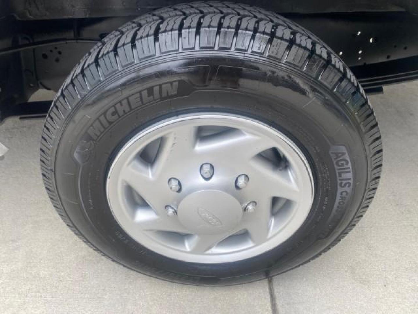 2014 Oxford White /Medium Flint Ford Econoline Cargo Van EXTENDED LOW MILES 6,380 1 OWNER (1FTNS1EW3ED) with an 4.6L EFI V8 FFV Capable Engine engine, Automatic transmission, located at 4701 North Dixie Hwy, Pompano Beach, FL, 33064, (954) 422-2889, 26.240938, -80.123474 - OUR WEBPAGE FLORIDACARS1.COM HAS OVER 100 PHOTOS AND FREE CARFAX LINK 2014 Ford E-Series E-150 1 OWNER Van 4.6L V8 F SOHC 16V Gasoline 16 MPG Rear Wheel Drive Features ABS Brakes Air Conditioning AM/FM Stereo Automatic Transmission Auxiliary Audio Input Barn Doors Power Locks Traction Control Vinyl - Photo#99