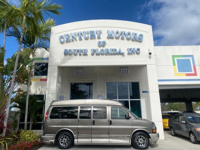 2004 Sandalwood Metallic /Neutral Chevrolet Express Passenger 1 OWNER HI TOP EXPLORER CONVERSION (1GBFG15T141) with an 5.3L Vortec 5300 V8 SFI Engine engine, Automatic transmission, located at 4701 North Dixie Hwy, Pompano Beach, FL, 33064, (954) 422-2889, 26.240938, -80.123474 - OUR WEBPAGE FLORIDACARS1.COM HAS OVER 100 PHOTOS AND FREE CARFAX LINK 2004 Chevrolet Express 1500 EXPLORER HIGH TOP CONVERSION TOP OF THE LINE LEATHER LOADED DUAL DOORS ON BOTH SIDES ONE OF A KIND FIND WILL NOT LAST IN STOCK Van 5.3L V8 F Gasoline 20 MPG Rear Wheel Drive Features ABS Brakes Air Cond - Photo#0