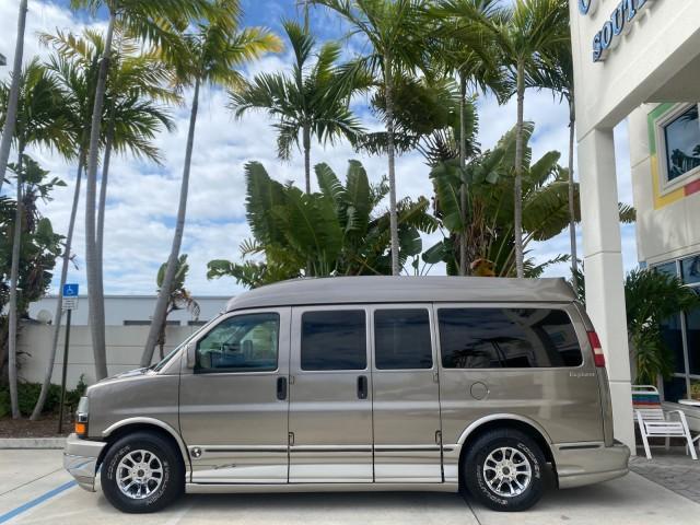 2004 Sandalwood Metallic /Neutral Chevrolet Express Passenger 1 OWNER HI TOP EXPLORER CONVERSION (1GBFG15T141) with an 5.3L Vortec 5300 V8 SFI Engine engine, Automatic transmission, located at 4701 North Dixie Hwy, Pompano Beach, FL, 33064, (954) 422-2889, 26.240938, -80.123474 - OUR WEBPAGE FLORIDACARS1.COM HAS OVER 100 PHOTOS AND FREE CARFAX LINK 2004 Chevrolet Express 1500 EXPLORER HIGH TOP CONVERSION TOP OF THE LINE LEATHER LOADED DUAL DOORS ON BOTH SIDES ONE OF A KIND FIND WILL NOT LAST IN STOCK Van 5.3L V8 F Gasoline 20 MPG Rear Wheel Drive Features ABS Brakes Air Cond - Photo#4
