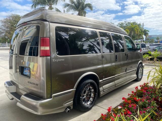 2004 Sandalwood Metallic /Neutral Chevrolet Express Passenger 1 OWNER HI TOP EXPLORER CONVERSION (1GBFG15T141) with an 5.3L Vortec 5300 V8 SFI Engine engine, Automatic transmission, located at 4701 North Dixie Hwy, Pompano Beach, FL, 33064, (954) 422-2889, 26.240938, -80.123474 - OUR WEBPAGE FLORIDACARS1.COM HAS OVER 100 PHOTOS AND FREE CARFAX LINK 2004 Chevrolet Express 1500 EXPLORER HIGH TOP CONVERSION TOP OF THE LINE LEATHER LOADED DUAL DOORS ON BOTH SIDES ONE OF A KIND FIND WILL NOT LAST IN STOCK Van 5.3L V8 F Gasoline 20 MPG Rear Wheel Drive Features ABS Brakes Air Cond - Photo#7
