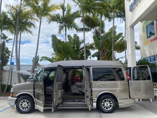 2004 Sandalwood Metallic /Neutral Chevrolet Express Passenger 1 OWNER HI TOP EXPLORER CONVERSION (1GBFG15T141) with an 5.3L Vortec 5300 V8 SFI Engine engine, Automatic transmission, located at 4701 North Dixie Hwy, Pompano Beach, FL, 33064, (954) 422-2889, 26.240938, -80.123474 - OUR WEBPAGE FLORIDACARS1.COM HAS OVER 100 PHOTOS AND FREE CARFAX LINK 2004 Chevrolet Express 1500 EXPLORER HIGH TOP CONVERSION TOP OF THE LINE LEATHER LOADED DUAL DOORS ON BOTH SIDES ONE OF A KIND FIND WILL NOT LAST IN STOCK Van 5.3L V8 F Gasoline 20 MPG Rear Wheel Drive Features ABS Brakes Air Cond - Photo#8