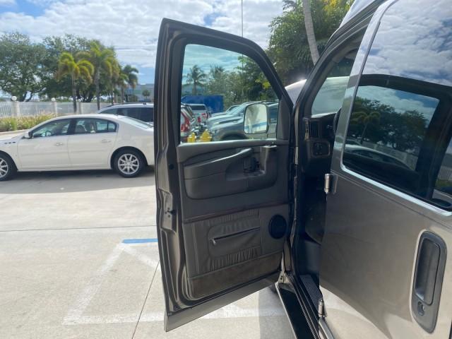2004 Sandalwood Metallic /Neutral Chevrolet Express Passenger 1 OWNER HI TOP EXPLORER CONVERSION (1GBFG15T141) with an 5.3L Vortec 5300 V8 SFI Engine engine, Automatic transmission, located at 4701 North Dixie Hwy, Pompano Beach, FL, 33064, (954) 422-2889, 26.240938, -80.123474 - OUR WEBPAGE FLORIDACARS1.COM HAS OVER 100 PHOTOS AND FREE CARFAX LINK 2004 Chevrolet Express 1500 EXPLORER HIGH TOP CONVERSION TOP OF THE LINE LEATHER LOADED DUAL DOORS ON BOTH SIDES ONE OF A KIND FIND WILL NOT LAST IN STOCK Van 5.3L V8 F Gasoline 20 MPG Rear Wheel Drive Features ABS Brakes Air Cond - Photo#9