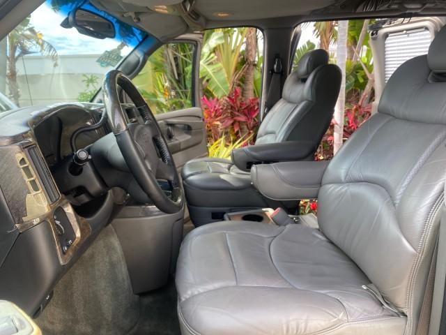 2004 Sandalwood Metallic /Neutral Chevrolet Express Passenger 1 OWNER HI TOP EXPLORER CONVERSION (1GBFG15T141) with an 5.3L Vortec 5300 V8 SFI Engine engine, Automatic transmission, located at 4701 North Dixie Hwy, Pompano Beach, FL, 33064, (954) 422-2889, 26.240938, -80.123474 - OUR WEBPAGE FLORIDACARS1.COM HAS OVER 100 PHOTOS AND FREE CARFAX LINK 2004 Chevrolet Express 1500 EXPLORER HIGH TOP CONVERSION TOP OF THE LINE LEATHER LOADED DUAL DOORS ON BOTH SIDES ONE OF A KIND FIND WILL NOT LAST IN STOCK Van 5.3L V8 F Gasoline 20 MPG Rear Wheel Drive Features ABS Brakes Air Cond - Photo#10