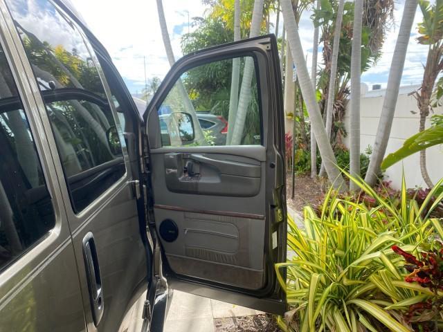2004 Sandalwood Metallic /Neutral Chevrolet Express Passenger 1 OWNER HI TOP EXPLORER CONVERSION (1GBFG15T141) with an 5.3L Vortec 5300 V8 SFI Engine engine, Automatic transmission, located at 4701 North Dixie Hwy, Pompano Beach, FL, 33064, (954) 422-2889, 26.240938, -80.123474 - OUR WEBPAGE FLORIDACARS1.COM HAS OVER 100 PHOTOS AND FREE CARFAX LINK 2004 Chevrolet Express 1500 EXPLORER HIGH TOP CONVERSION TOP OF THE LINE LEATHER LOADED DUAL DOORS ON BOTH SIDES ONE OF A KIND FIND WILL NOT LAST IN STOCK Van 5.3L V8 F Gasoline 20 MPG Rear Wheel Drive Features ABS Brakes Air Cond - Photo#11