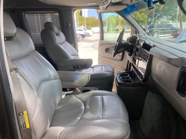 2004 Sandalwood Metallic /Neutral Chevrolet Express Passenger 1 OWNER HI TOP EXPLORER CONVERSION (1GBFG15T141) with an 5.3L Vortec 5300 V8 SFI Engine engine, Automatic transmission, located at 4701 North Dixie Hwy, Pompano Beach, FL, 33064, (954) 422-2889, 26.240938, -80.123474 - OUR WEBPAGE FLORIDACARS1.COM HAS OVER 100 PHOTOS AND FREE CARFAX LINK 2004 Chevrolet Express 1500 EXPLORER HIGH TOP CONVERSION TOP OF THE LINE LEATHER LOADED DUAL DOORS ON BOTH SIDES ONE OF A KIND FIND WILL NOT LAST IN STOCK Van 5.3L V8 F Gasoline 20 MPG Rear Wheel Drive Features ABS Brakes Air Cond - Photo#12