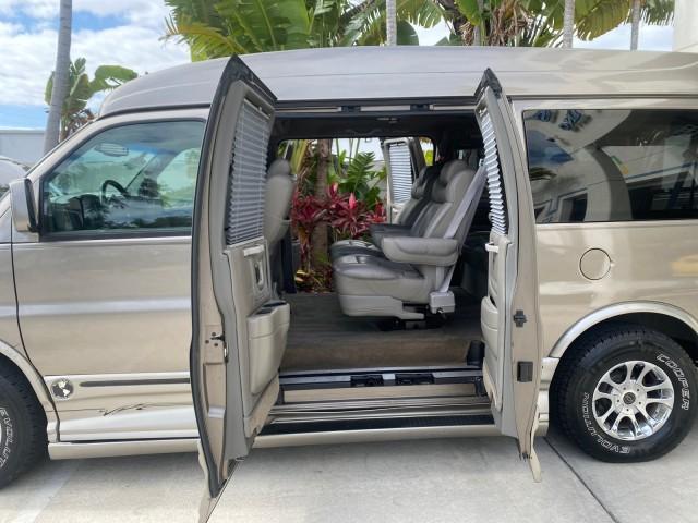 2004 Sandalwood Metallic /Neutral Chevrolet Express Passenger 1 OWNER HI TOP EXPLORER CONVERSION (1GBFG15T141) with an 5.3L Vortec 5300 V8 SFI Engine engine, Automatic transmission, located at 4701 North Dixie Hwy, Pompano Beach, FL, 33064, (954) 422-2889, 26.240938, -80.123474 - OUR WEBPAGE FLORIDACARS1.COM HAS OVER 100 PHOTOS AND FREE CARFAX LINK 2004 Chevrolet Express 1500 EXPLORER HIGH TOP CONVERSION TOP OF THE LINE LEATHER LOADED DUAL DOORS ON BOTH SIDES ONE OF A KIND FIND WILL NOT LAST IN STOCK Van 5.3L V8 F Gasoline 20 MPG Rear Wheel Drive Features ABS Brakes Air Cond - Photo#13