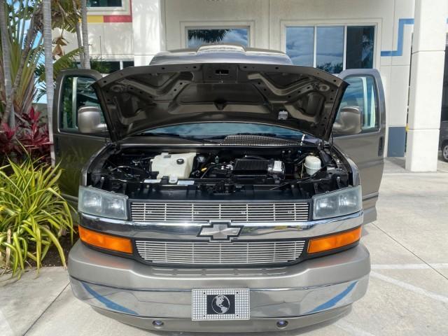 2004 Sandalwood Metallic /Neutral Chevrolet Express Passenger 1 OWNER HI TOP EXPLORER CONVERSION (1GBFG15T141) with an 5.3L Vortec 5300 V8 SFI Engine engine, Automatic transmission, located at 4701 North Dixie Hwy, Pompano Beach, FL, 33064, (954) 422-2889, 26.240938, -80.123474 - OUR WEBPAGE FLORIDACARS1.COM HAS OVER 100 PHOTOS AND FREE CARFAX LINK 2004 Chevrolet Express 1500 EXPLORER HIGH TOP CONVERSION TOP OF THE LINE LEATHER LOADED DUAL DOORS ON BOTH SIDES ONE OF A KIND FIND WILL NOT LAST IN STOCK Van 5.3L V8 F Gasoline 20 MPG Rear Wheel Drive Features ABS Brakes Air Cond - Photo#17