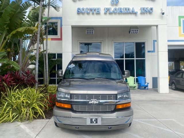 2004 Sandalwood Metallic /Neutral Chevrolet Express Passenger 1 OWNER HI TOP EXPLORER CONVERSION (1GBFG15T141) with an 5.3L Vortec 5300 V8 SFI Engine engine, Automatic transmission, located at 4701 North Dixie Hwy, Pompano Beach, FL, 33064, (954) 422-2889, 26.240938, -80.123474 - OUR WEBPAGE FLORIDACARS1.COM HAS OVER 100 PHOTOS AND FREE CARFAX LINK 2004 Chevrolet Express 1500 EXPLORER HIGH TOP CONVERSION TOP OF THE LINE LEATHER LOADED DUAL DOORS ON BOTH SIDES ONE OF A KIND FIND WILL NOT LAST IN STOCK Van 5.3L V8 F Gasoline 20 MPG Rear Wheel Drive Features ABS Brakes Air Cond - Photo#26