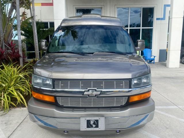 2004 Sandalwood Metallic /Neutral Chevrolet Express Passenger 1 OWNER HI TOP EXPLORER CONVERSION (1GBFG15T141) with an 5.3L Vortec 5300 V8 SFI Engine engine, Automatic transmission, located at 4701 North Dixie Hwy, Pompano Beach, FL, 33064, (954) 422-2889, 26.240938, -80.123474 - OUR WEBPAGE FLORIDACARS1.COM HAS OVER 100 PHOTOS AND FREE CARFAX LINK 2004 Chevrolet Express 1500 EXPLORER HIGH TOP CONVERSION TOP OF THE LINE LEATHER LOADED DUAL DOORS ON BOTH SIDES ONE OF A KIND FIND WILL NOT LAST IN STOCK Van 5.3L V8 F Gasoline 20 MPG Rear Wheel Drive Features ABS Brakes Air Cond - Photo#27