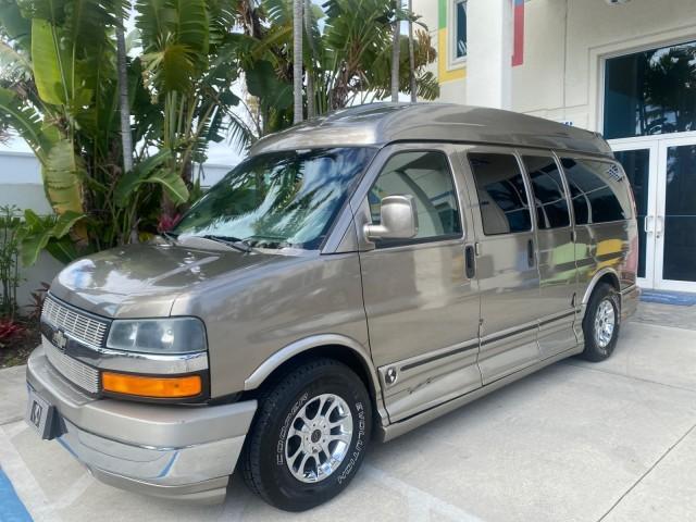 2004 Sandalwood Metallic /Neutral Chevrolet Express Passenger 1 OWNER HI TOP EXPLORER CONVERSION (1GBFG15T141) with an 5.3L Vortec 5300 V8 SFI Engine engine, Automatic transmission, located at 4701 North Dixie Hwy, Pompano Beach, FL, 33064, (954) 422-2889, 26.240938, -80.123474 - OUR WEBPAGE FLORIDACARS1.COM HAS OVER 100 PHOTOS AND FREE CARFAX LINK 2004 Chevrolet Express 1500 EXPLORER HIGH TOP CONVERSION TOP OF THE LINE LEATHER LOADED DUAL DOORS ON BOTH SIDES ONE OF A KIND FIND WILL NOT LAST IN STOCK Van 5.3L V8 F Gasoline 20 MPG Rear Wheel Drive Features ABS Brakes Air Cond - Photo#29