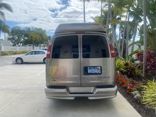 2004 Sandalwood Metallic /Neutral Chevrolet Express Passenger 1 OWNER HI TOP EXPLORER CONVERSION (1GBFG15T141) with an 5.3L Vortec 5300 V8 SFI Engine engine, Automatic transmission, located at 4701 North Dixie Hwy, Pompano Beach, FL, 33064, (954) 422-2889, 26.240938, -80.123474 - OUR WEBPAGE FLORIDACARS1.COM HAS OVER 100 PHOTOS AND FREE CARFAX LINK 2004 Chevrolet Express 1500 EXPLORER HIGH TOP CONVERSION TOP OF THE LINE LEATHER LOADED DUAL DOORS ON BOTH SIDES ONE OF A KIND FIND WILL NOT LAST IN STOCK Van 5.3L V8 F Gasoline 20 MPG Rear Wheel Drive Features ABS Brakes Air Cond - Photo#34