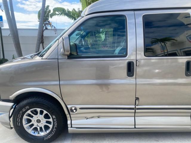 2004 Sandalwood Metallic /Neutral Chevrolet Express Passenger 1 OWNER HI TOP EXPLORER CONVERSION (1GBFG15T141) with an 5.3L Vortec 5300 V8 SFI Engine engine, Automatic transmission, located at 4701 North Dixie Hwy, Pompano Beach, FL, 33064, (954) 422-2889, 26.240938, -80.123474 - OUR WEBPAGE FLORIDACARS1.COM HAS OVER 100 PHOTOS AND FREE CARFAX LINK 2004 Chevrolet Express 1500 EXPLORER HIGH TOP CONVERSION TOP OF THE LINE LEATHER LOADED DUAL DOORS ON BOTH SIDES ONE OF A KIND FIND WILL NOT LAST IN STOCK Van 5.3L V8 F Gasoline 20 MPG Rear Wheel Drive Features ABS Brakes Air Cond - Photo#37
