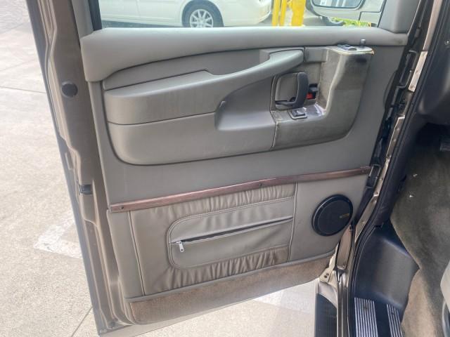 2004 Sandalwood Metallic /Neutral Chevrolet Express Passenger 1 OWNER HI TOP EXPLORER CONVERSION (1GBFG15T141) with an 5.3L Vortec 5300 V8 SFI Engine engine, Automatic transmission, located at 4701 North Dixie Hwy, Pompano Beach, FL, 33064, (954) 422-2889, 26.240938, -80.123474 - OUR WEBPAGE FLORIDACARS1.COM HAS OVER 100 PHOTOS AND FREE CARFAX LINK 2004 Chevrolet Express 1500 EXPLORER HIGH TOP CONVERSION TOP OF THE LINE LEATHER LOADED DUAL DOORS ON BOTH SIDES ONE OF A KIND FIND WILL NOT LAST IN STOCK Van 5.3L V8 F Gasoline 20 MPG Rear Wheel Drive Features ABS Brakes Air Cond - Photo#42