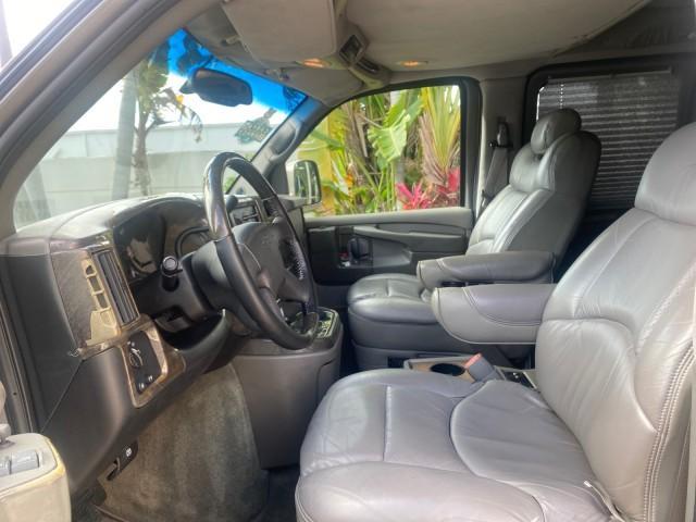 2004 Sandalwood Metallic /Neutral Chevrolet Express Passenger 1 OWNER HI TOP EXPLORER CONVERSION (1GBFG15T141) with an 5.3L Vortec 5300 V8 SFI Engine engine, Automatic transmission, located at 4701 North Dixie Hwy, Pompano Beach, FL, 33064, (954) 422-2889, 26.240938, -80.123474 - OUR WEBPAGE FLORIDACARS1.COM HAS OVER 100 PHOTOS AND FREE CARFAX LINK 2004 Chevrolet Express 1500 EXPLORER HIGH TOP CONVERSION TOP OF THE LINE LEATHER LOADED DUAL DOORS ON BOTH SIDES ONE OF A KIND FIND WILL NOT LAST IN STOCK Van 5.3L V8 F Gasoline 20 MPG Rear Wheel Drive Features ABS Brakes Air Cond - Photo#45