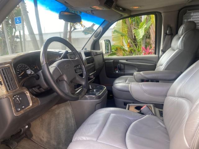 2004 Sandalwood Metallic /Neutral Chevrolet Express Passenger 1 OWNER HI TOP EXPLORER CONVERSION (1GBFG15T141) with an 5.3L Vortec 5300 V8 SFI Engine engine, Automatic transmission, located at 4701 North Dixie Hwy, Pompano Beach, FL, 33064, (954) 422-2889, 26.240938, -80.123474 - OUR WEBPAGE FLORIDACARS1.COM HAS OVER 100 PHOTOS AND FREE CARFAX LINK 2004 Chevrolet Express 1500 EXPLORER HIGH TOP CONVERSION TOP OF THE LINE LEATHER LOADED DUAL DOORS ON BOTH SIDES ONE OF A KIND FIND WILL NOT LAST IN STOCK Van 5.3L V8 F Gasoline 20 MPG Rear Wheel Drive Features ABS Brakes Air Cond - Photo#46