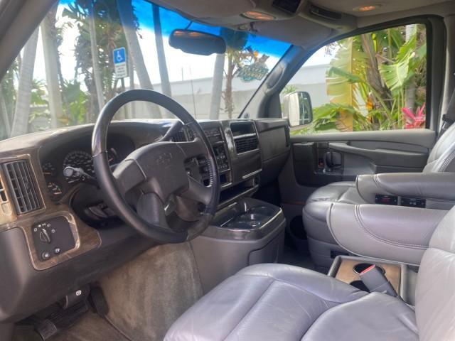 2004 Sandalwood Metallic /Neutral Chevrolet Express Passenger 1 OWNER HI TOP EXPLORER CONVERSION (1GBFG15T141) with an 5.3L Vortec 5300 V8 SFI Engine engine, Automatic transmission, located at 4701 North Dixie Hwy, Pompano Beach, FL, 33064, (954) 422-2889, 26.240938, -80.123474 - OUR WEBPAGE FLORIDACARS1.COM HAS OVER 100 PHOTOS AND FREE CARFAX LINK 2004 Chevrolet Express 1500 EXPLORER HIGH TOP CONVERSION TOP OF THE LINE LEATHER LOADED DUAL DOORS ON BOTH SIDES ONE OF A KIND FIND WILL NOT LAST IN STOCK Van 5.3L V8 F Gasoline 20 MPG Rear Wheel Drive Features ABS Brakes Air Cond - Photo#47