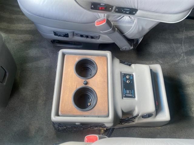 2004 Sandalwood Metallic /Neutral Chevrolet Express Passenger 1 OWNER HI TOP EXPLORER CONVERSION (1GBFG15T141) with an 5.3L Vortec 5300 V8 SFI Engine engine, Automatic transmission, located at 4701 North Dixie Hwy, Pompano Beach, FL, 33064, (954) 422-2889, 26.240938, -80.123474 - OUR WEBPAGE FLORIDACARS1.COM HAS OVER 100 PHOTOS AND FREE CARFAX LINK 2004 Chevrolet Express 1500 EXPLORER HIGH TOP CONVERSION TOP OF THE LINE LEATHER LOADED DUAL DOORS ON BOTH SIDES ONE OF A KIND FIND WILL NOT LAST IN STOCK Van 5.3L V8 F Gasoline 20 MPG Rear Wheel Drive Features ABS Brakes Air Cond - Photo#68