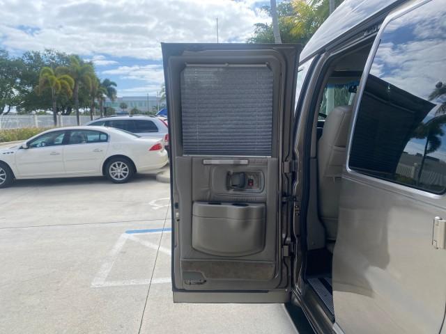 2004 Sandalwood Metallic /Neutral Chevrolet Express Passenger 1 OWNER HI TOP EXPLORER CONVERSION (1GBFG15T141) with an 5.3L Vortec 5300 V8 SFI Engine engine, Automatic transmission, located at 4701 North Dixie Hwy, Pompano Beach, FL, 33064, (954) 422-2889, 26.240938, -80.123474 - OUR WEBPAGE FLORIDACARS1.COM HAS OVER 100 PHOTOS AND FREE CARFAX LINK 2004 Chevrolet Express 1500 EXPLORER HIGH TOP CONVERSION TOP OF THE LINE LEATHER LOADED DUAL DOORS ON BOTH SIDES ONE OF A KIND FIND WILL NOT LAST IN STOCK Van 5.3L V8 F Gasoline 20 MPG Rear Wheel Drive Features ABS Brakes Air Cond - Photo#72