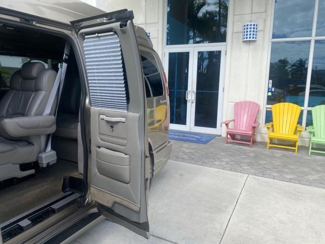 2004 Sandalwood Metallic /Neutral Chevrolet Express Passenger 1 OWNER HI TOP EXPLORER CONVERSION (1GBFG15T141) with an 5.3L Vortec 5300 V8 SFI Engine engine, Automatic transmission, located at 4701 North Dixie Hwy, Pompano Beach, FL, 33064, (954) 422-2889, 26.240938, -80.123474 - OUR WEBPAGE FLORIDACARS1.COM HAS OVER 100 PHOTOS AND FREE CARFAX LINK 2004 Chevrolet Express 1500 EXPLORER HIGH TOP CONVERSION TOP OF THE LINE LEATHER LOADED DUAL DOORS ON BOTH SIDES ONE OF A KIND FIND WILL NOT LAST IN STOCK Van 5.3L V8 F Gasoline 20 MPG Rear Wheel Drive Features ABS Brakes Air Cond - Photo#74