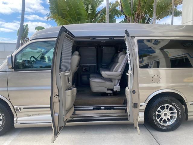 2004 Sandalwood Metallic /Neutral Chevrolet Express Passenger 1 OWNER HI TOP EXPLORER CONVERSION (1GBFG15T141) with an 5.3L Vortec 5300 V8 SFI Engine engine, Automatic transmission, located at 4701 North Dixie Hwy, Pompano Beach, FL, 33064, (954) 422-2889, 26.240938, -80.123474 - OUR WEBPAGE FLORIDACARS1.COM HAS OVER 100 PHOTOS AND FREE CARFAX LINK 2004 Chevrolet Express 1500 EXPLORER HIGH TOP CONVERSION TOP OF THE LINE LEATHER LOADED DUAL DOORS ON BOTH SIDES ONE OF A KIND FIND WILL NOT LAST IN STOCK Van 5.3L V8 F Gasoline 20 MPG Rear Wheel Drive Features ABS Brakes Air Cond - Photo#75