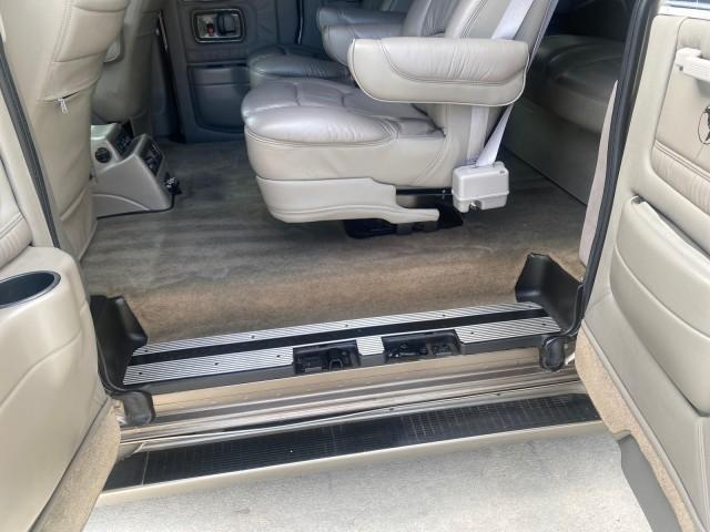 2004 Sandalwood Metallic /Neutral Chevrolet Express Passenger 1 OWNER HI TOP EXPLORER CONVERSION (1GBFG15T141) with an 5.3L Vortec 5300 V8 SFI Engine engine, Automatic transmission, located at 4701 North Dixie Hwy, Pompano Beach, FL, 33064, (954) 422-2889, 26.240938, -80.123474 - OUR WEBPAGE FLORIDACARS1.COM HAS OVER 100 PHOTOS AND FREE CARFAX LINK 2004 Chevrolet Express 1500 EXPLORER HIGH TOP CONVERSION TOP OF THE LINE LEATHER LOADED DUAL DOORS ON BOTH SIDES ONE OF A KIND FIND WILL NOT LAST IN STOCK Van 5.3L V8 F Gasoline 20 MPG Rear Wheel Drive Features ABS Brakes Air Cond - Photo#76