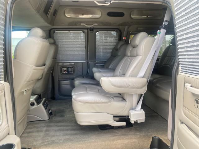 2004 Sandalwood Metallic /Neutral Chevrolet Express Passenger 1 OWNER HI TOP EXPLORER CONVERSION (1GBFG15T141) with an 5.3L Vortec 5300 V8 SFI Engine engine, Automatic transmission, located at 4701 North Dixie Hwy, Pompano Beach, FL, 33064, (954) 422-2889, 26.240938, -80.123474 - OUR WEBPAGE FLORIDACARS1.COM HAS OVER 100 PHOTOS AND FREE CARFAX LINK 2004 Chevrolet Express 1500 EXPLORER HIGH TOP CONVERSION TOP OF THE LINE LEATHER LOADED DUAL DOORS ON BOTH SIDES ONE OF A KIND FIND WILL NOT LAST IN STOCK Van 5.3L V8 F Gasoline 20 MPG Rear Wheel Drive Features ABS Brakes Air Cond - Photo#77