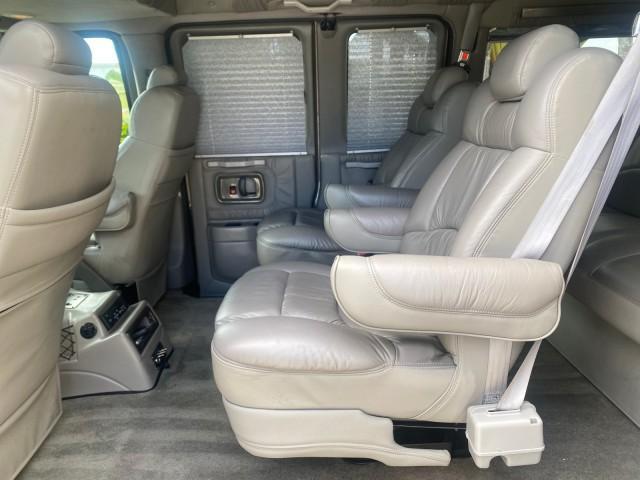 2004 Sandalwood Metallic /Neutral Chevrolet Express Passenger 1 OWNER HI TOP EXPLORER CONVERSION (1GBFG15T141) with an 5.3L Vortec 5300 V8 SFI Engine engine, Automatic transmission, located at 4701 North Dixie Hwy, Pompano Beach, FL, 33064, (954) 422-2889, 26.240938, -80.123474 - OUR WEBPAGE FLORIDACARS1.COM HAS OVER 100 PHOTOS AND FREE CARFAX LINK 2004 Chevrolet Express 1500 EXPLORER HIGH TOP CONVERSION TOP OF THE LINE LEATHER LOADED DUAL DOORS ON BOTH SIDES ONE OF A KIND FIND WILL NOT LAST IN STOCK Van 5.3L V8 F Gasoline 20 MPG Rear Wheel Drive Features ABS Brakes Air Cond - Photo#78