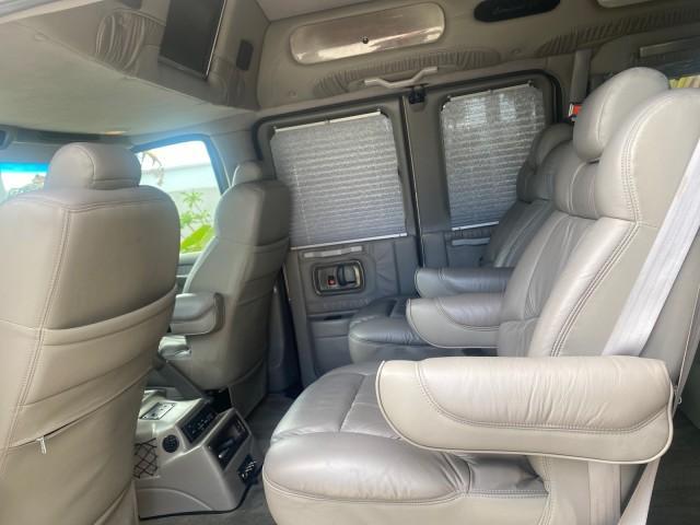 2004 Sandalwood Metallic /Neutral Chevrolet Express Passenger 1 OWNER HI TOP EXPLORER CONVERSION (1GBFG15T141) with an 5.3L Vortec 5300 V8 SFI Engine engine, Automatic transmission, located at 4701 North Dixie Hwy, Pompano Beach, FL, 33064, (954) 422-2889, 26.240938, -80.123474 - OUR WEBPAGE FLORIDACARS1.COM HAS OVER 100 PHOTOS AND FREE CARFAX LINK 2004 Chevrolet Express 1500 EXPLORER HIGH TOP CONVERSION TOP OF THE LINE LEATHER LOADED DUAL DOORS ON BOTH SIDES ONE OF A KIND FIND WILL NOT LAST IN STOCK Van 5.3L V8 F Gasoline 20 MPG Rear Wheel Drive Features ABS Brakes Air Cond - Photo#79